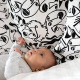 baby-looking-at-black-and-white-facial-sensory-muslins