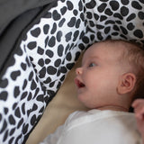 baby-looking-at-black-and-white-reversible-sensory-strip