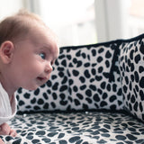 baby-on-belly-looking-at-black-and-white-reversible-sensory-strip